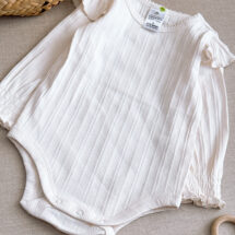 بادی دخترانه برند cotton مدل کرم کبریتی چیندار
